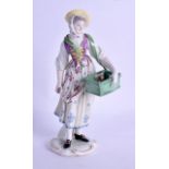 Ludwigsburg figure of a female street vendor carry her ware in a carton with straps over her