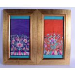 A PAIR OF EARLY 20TH CENTURY CHINESE FRAMED SILK SLEEVES decorated with flowers, together with a