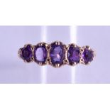 AN EDWARDIAN 9CT GOLD AND AMETHYST RING. 3.5 grams. Size T.