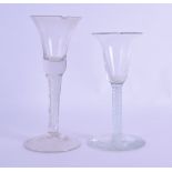 TWO 18TH CENTURY GLASSES one with spirally twisted stem. 17 cm & 15 cm high. (2)
