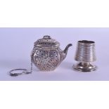 AN UNUSUAL EARLY 20TH CENTURY CONTINENTAL SILVER MINIATURE TEAPOT together with a silver candle