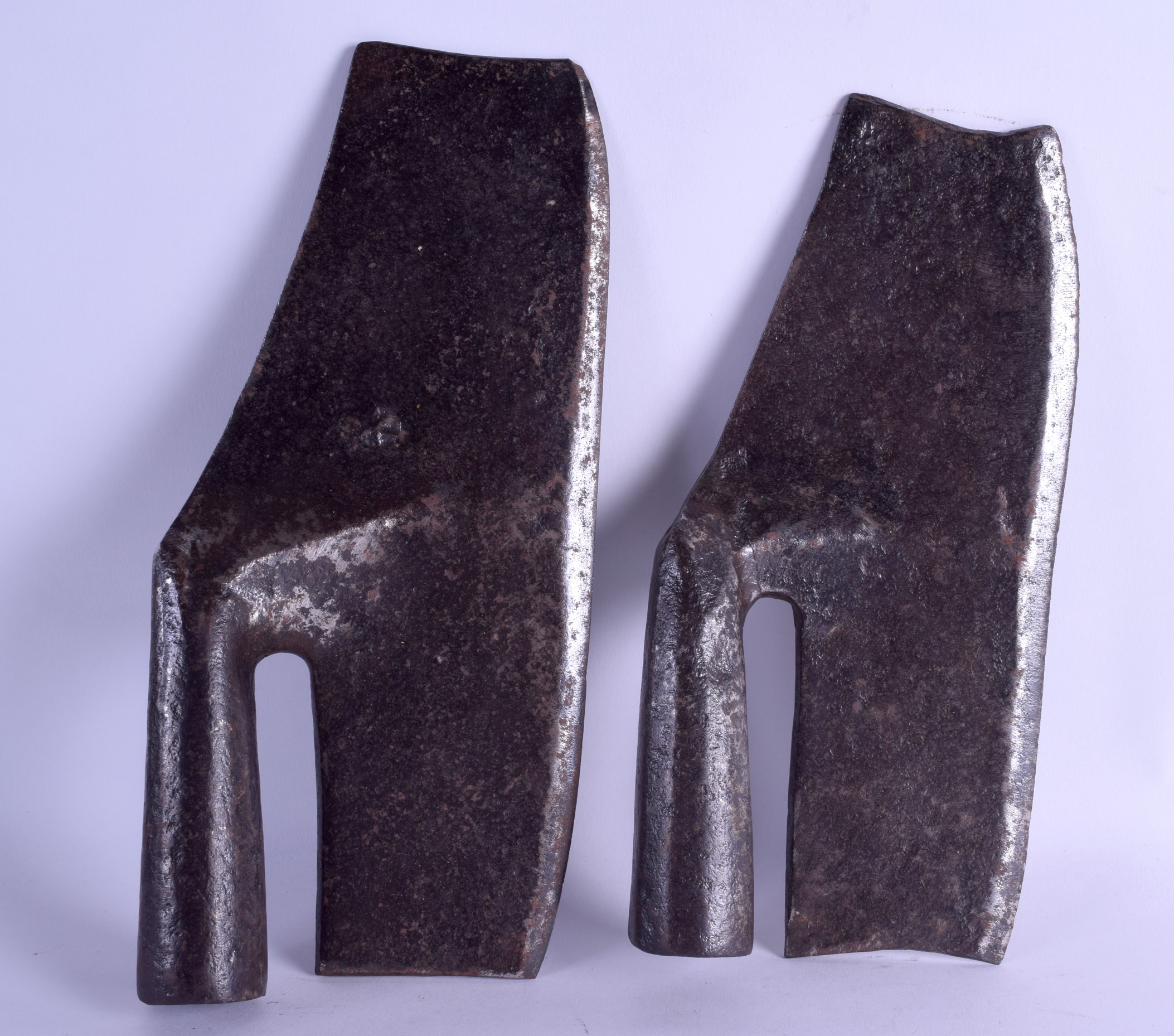 TWO EARLY EUROPEAN FORGED IRON BLADES. 32 cm long.