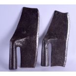 TWO EARLY EUROPEAN FORGED IRON BLADES. 32 cm long.