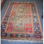 A GOOD TURKISH CAUCASIAN RUG, decorated with symbols. 200 cm x 145 cm.