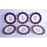 Royal Crown Derby set of six dessert plates painted with flowers under a raised gilt cobalt blue