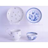 AN 18TH CENTURY MEISSEN BLUE AND WHITE TEABOWL AND SAUCER together with another Meissen bell