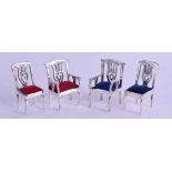 AN UNUSUAL GROUP OF FOUR MINIATURE SILVER CHAIRS. (4)