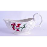 Mid 18th c. Chantilly rare moulded sauceboat painted with two specimen plants and a butterfly,