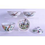 A NEAR PAIR OF 19TH CENTURY CHINESE FAMILLE ROSE BUTTERFLY BOWLS Tongzhi, together with a similar