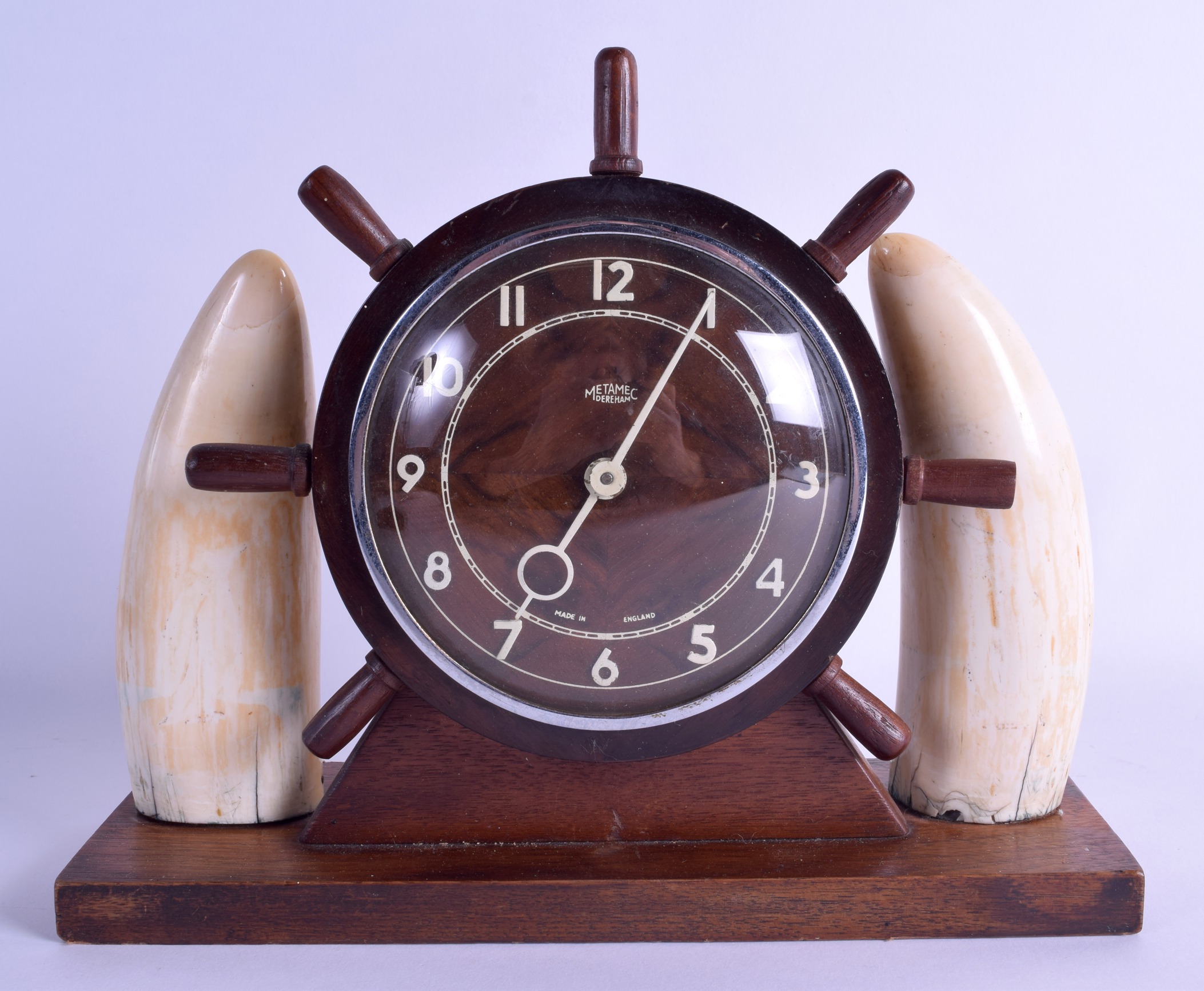 AN EARLY 20TH CENTURY CARVED OAK SHIPS WHEEL MARITIME MANTEL CLOCK by Metamec of Dereham. 26 cm x 22