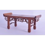 A CHARMING CHINESE CARVED MINIATURE HARDWOOD SCHOLARS ALTAR TABLE of scrolling form. 17 cm x 7 cm.