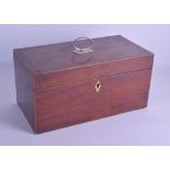 A VICTORIAN CARVED MAHOGANY RECTANGULAR TEA CADDY with green glass liner and box wood string