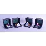 AN UNUSUAL SET OF FOUR BOXED STAMP PAPERWEIGHTS in the shape of pyramids. 6 cm wide. (4)
