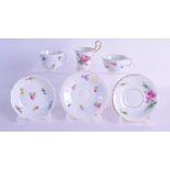 A GROUP OF THREE 19TH CENTURY MEISSEN CUPS AND SAUCERS painted with flowers. (6)