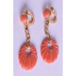 A PAIR OF ANTIQUE YELLOW GOLD AND RED CORAL EARRINGS. 7.3 grams. Coral 1 cm x 1.75 cm.