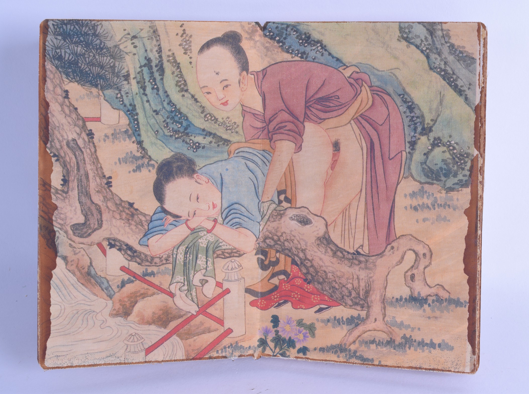 A CHINESE FIVE SECTION EROTIC FOLDING BOOKLET depicting figures within interiors and landscapes,