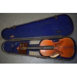 AN EARLY 20TH CENTURY ITALIAN VIOLIN, cased.