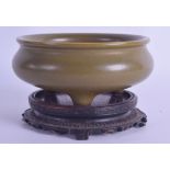 A CHINESE QING DYNASTY TEADUST PORCELAIN CENSER bearing Qianlong marks to base. 12 cm diameter.