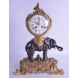 A GOOD 19TH CENTURY FRENCH ORMOLU AND BRONZE MANTEL CLOCK modelled as a standing elephant with a