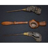 TWO ANTIQUE CHISELS WITH CARVED FIGURAL HANDLE, together with a pipe.(3)