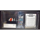 A RARE VINTAGE STAR WARS BOBA FETT FIGURINE, in a presentation case.