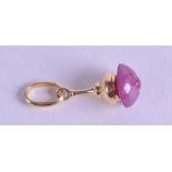 A 18CT GOLD AND AMETHYST CHARM. 2.6 grams.