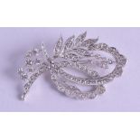 A PLATINUM AND DIAMOND FLORAL SPRAY BROOCH. 16.4 grams. 5 cm x 3 cm.