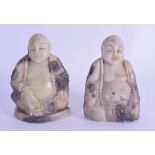 A PAIR OF LATE 19TH CENTURY CHINESE CARVED SOAPSTONE FIGURES OF BUDDHAS modelled seated. 10.5 cm &