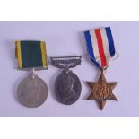 A TERRITORIAL MEDAL presented to Pte N L Patrick RAMC, together with two others. (3)