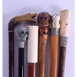 A COLLECTION OF SIX 19TH/20TH CENTURY WALKING CANES in various forms, including a tortoiseshell