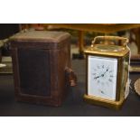 A GOOD FRENCH REPEATING GRAND SONNERIE BRASS CARRIAGE CLOCK with fitted leather case. 18 cm high inc