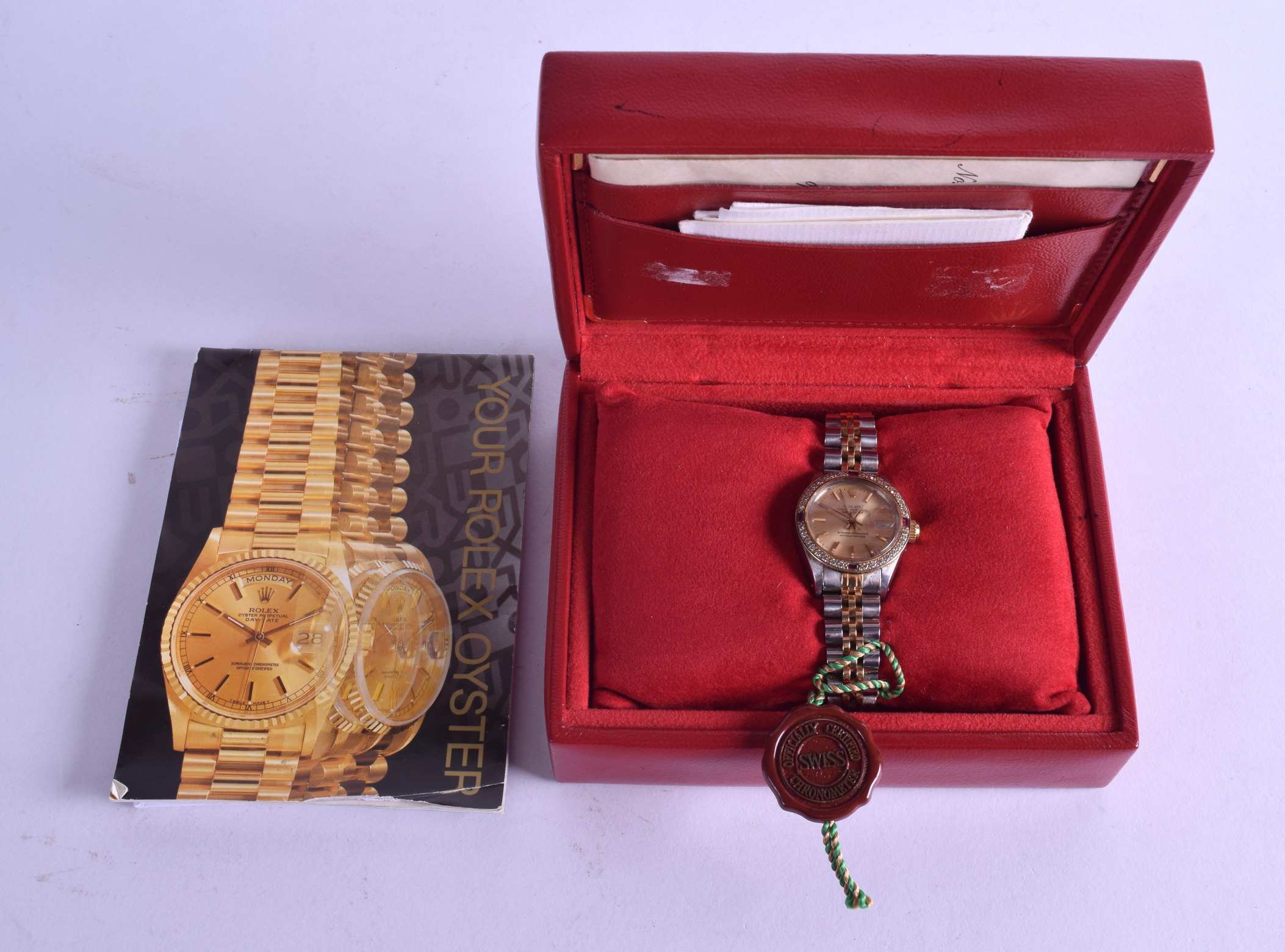 A LADIES GOLD STEEL AND DIAMOND ROLEX WRISTWATCH with original box and papers. Dial 2.5 cm