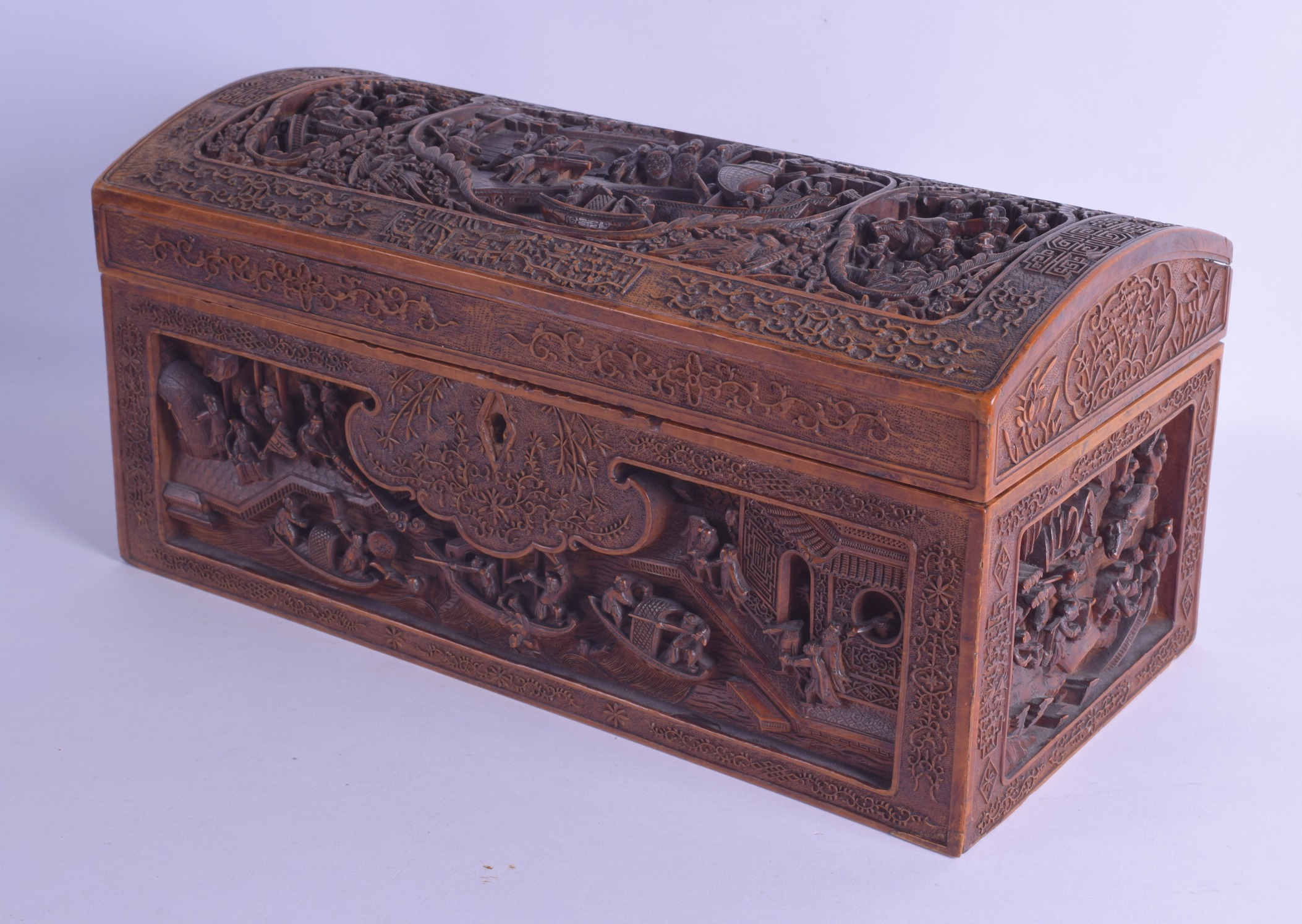 AN IMPORTANT LARGE 18TH/19TH CENTURY CHINESE CARVED SANDALWOOD CASKET AND COVER by Sung Sing Gung,