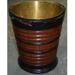 AN ANTIQUE WOODEN BUCKET, with ribbed body. 36 cm high.