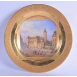 A LATE 19TH CENTURY AUSTRIAN VIENNA PORCELAIN CABINET PLATE painted with a view of a town. 24 cm