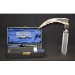 A TIMESCO LARYNGOSCOPE, together with a cased device. (2)