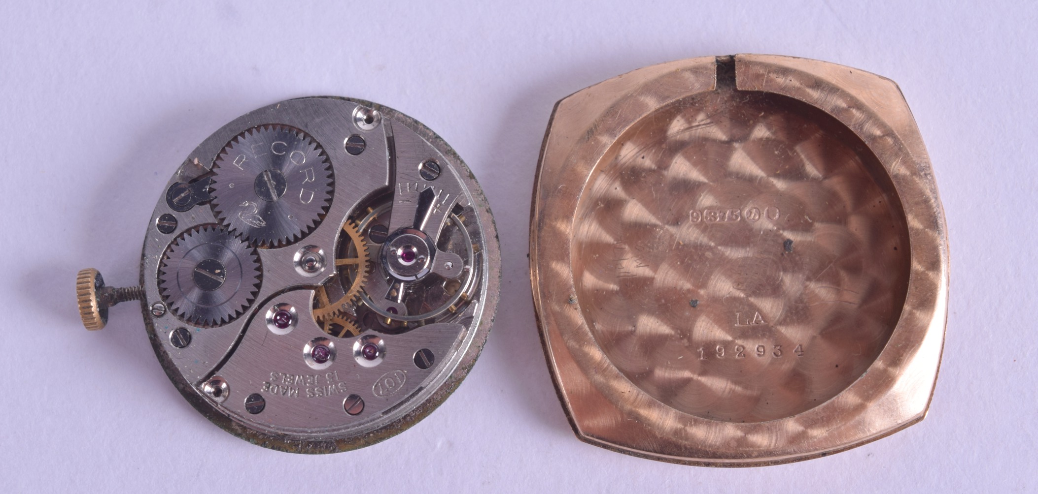 A VINTAGE 9CT GOLD RECORD WATCH DIAL FACE and movement. 17.6 grams. 2.5 cm wide. - Image 2 of 2