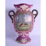 A LARGE LATE 19TH CENTURY FRENCH PARIS PORCELAIN TWIN HANDLED VASE painted with landscapes upon a