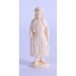 AN UNUSUAL LATE 19TH CENTURY EUROPEAN IVORY SEAL in the form of a standing female. 6.75 cm high.