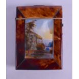 A MID 19TH CENTURY CARVED TORTOISESHELL REVERSE PAINTED CARD CASE painted with river scenes and