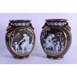 A LOVELY PAIR OF LATE 19TH CENTURY PATE SUR PATE PORCELAIN VASES painted with classical scenes