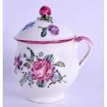18th c. Mennecy custard cup and cover with fine spiral moulding painted with roses and other