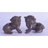 A PAIR OF CHINESE BRONZE FIGURES OF BUDDHISTIC LIONS 20th Century, modelled scowling. 7.75 cm wide.