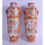 A RARE LARGE PAIR OF 19TH CENTURY JAPANESE ,MEIJI PERIOD KUTANI VASES with coral rope twist draped