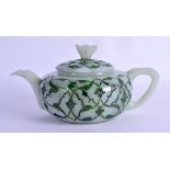 AN UNUSUAL TURKISH OTTOMAN CARVED GREEN JADE TEAPOT AND COVER incised with scrolling foliage and