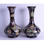 A GOOD RARE LARGE PAIR OF 19TH CENTURY ENAMELLED PORCELAIN VASES painted with Chinese figures in the