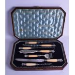 A GOOD BOXED VICTORIAN SILVER AND CARVED IVORY SHEFFIELD PLATE SERVING TOOLS by Walker & Hall.