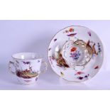 Late 18th/early 19th c. Berlin two handled chocolate and trembleuse saucer painted with hunting