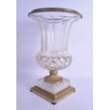 A FINE REGENCY CUT GLASS AND ORMOLU VASE with facetted body and acanthus capped mounts. 35 cm x 21