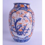 A 19TH CENTURY JAPANESE MEIJI PERIOD IMARI PORCELAIN VASE painted with flowers and vines. 27 cm